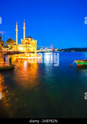 historic Ortakoy mosque and its reflection in the seawater Stock Photo ...