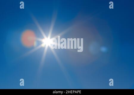 sun on the blue sky Stock Photo