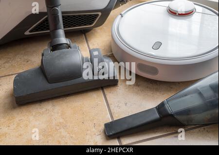 Three different types of vacuum cleaners for cleaning your home floor Stock Photo