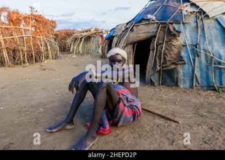 Dassanech Tribe Old Man with Traditional Bright Necklace and White Turban in the Local Village Stock Photo