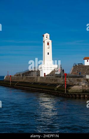 Twin lighthouse, phare, by André Pavlovsky in Ciboure and Saint Jean de Luz in the French Basque Country, Pyrenees Atlantique, constructed in 1936. Stock Photo