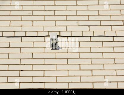Motion Flood Light. How to Choose and Install Motion Detector Lighting. Motion Sensor Stock Photo