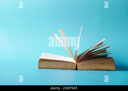 open book and a pencil on wooden table  Stock Photo