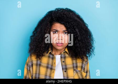 Photo of speechless lady frustrated look camera unfair occasion concept wear plaid shirt isolated blue color background Stock Photo