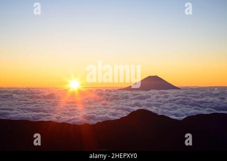 Mount Fuji And Sunrise From Akaishi-Dake In The Southern Alps Stock Photo