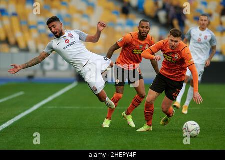 KYIV, UKRAINE - OCTOBER 15, 2021: midfielder Fernando (99) defender Mykola Matviyenko (22) vs Allahyar Sayyadmanesh (90). The football match of UPL, F Stock Photo