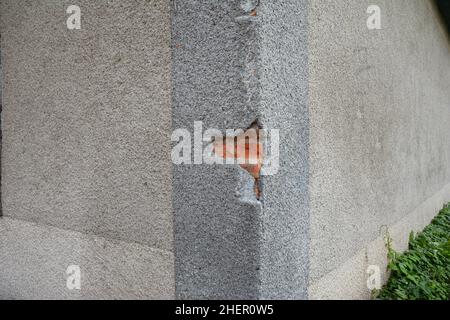 Fixing, Repair House Facade Wall Cracks. Cracking In House Facade Concrete Wall Outdoor. Cracked Wall. Stock Photo