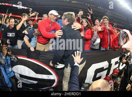 Georgia head coach Kirby Smart celebrates with fans after winning the 2022 CFP college football national championship game at Lucas Oil Stadium, Monda Stock Photo