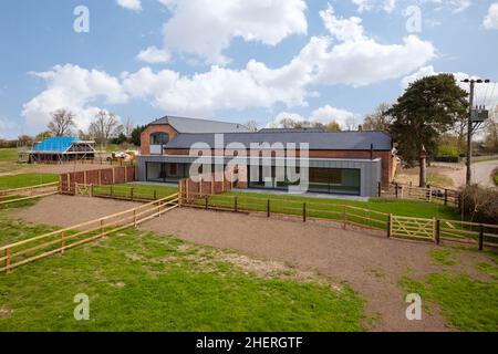 Cowlinge, Suffolk, England - 9 April 2019: Aerial view of stylish brick ...