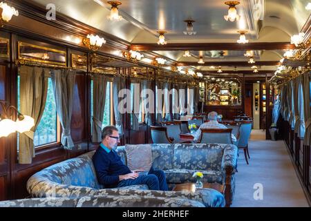 Saloon wagon of Al-Andalus luxury train travelling around Andalusia Spain.  The Al Andalus train takes a tour of 7 days and 6 nights, visiting cities Stock Photo