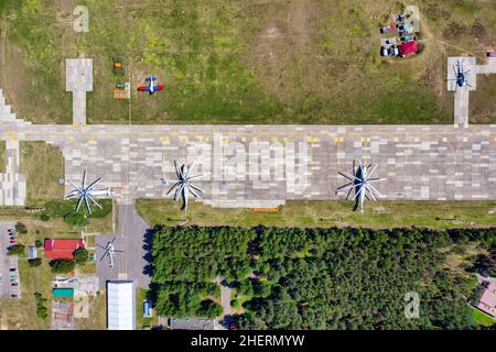 Helicopters on a small airfield aerial view. Runway shot from above. Small municipal airport Stock Photo