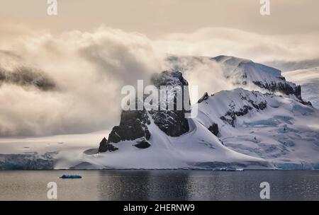 Rocky mountains in wilhelmina bay, glaciers and ice caps in Antarctica Stock Photo