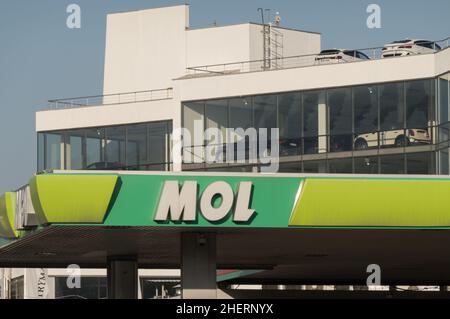 Budapest. 12th Jan, 2022. MOL service station is seen in Budapest, Hungary on Jan. 12, 2022. Hungary's leading gas and oil firm MOL signed a 610 million-U.S. dollar contract with Grupo Lotos SA and PKN Orlen to acquire 417 service stations in Poland, MOL announced Wednesday on the website of the Budapest Stock Exchange (BSE). Credit: Attila Volgyi/Xinhua/Alamy Live News Stock Photo