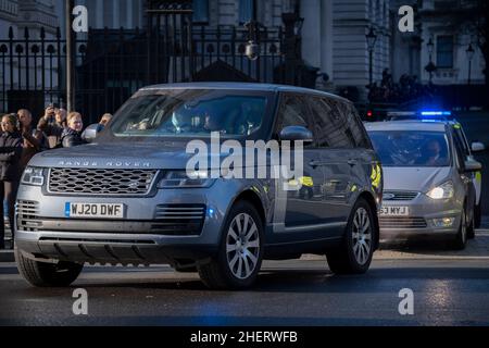 On the day that British Prime Minister Boris Johnson appears for the weekly Prime Minister's Questions (PMQs), his security cavalcade leaves Downing Street on the way to parliament, on 12th January 2022, in London, England. Johnson apologised to parliament for office parties held in Downing Street during the Covid pandemic but insisted that he was unaware that these were gatherings social that broke pandemic restrictions. Stock Photo