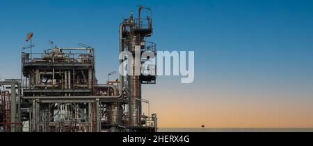 Petroleum Oil refinery barrel tank. petrochemical plant. factory chemical industry. oil and gas petrochemical industrial. many oil storage tank and pi Stock Photo