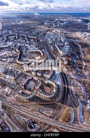 Aerial cityscape of dormitory district of Minsk, Belarus. Sunset aerial view on modern post soviet belarus city Stock Photo