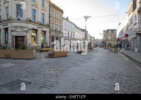 Truro, UK,12th January 2022,Lemon Quay was quiet this afternoon despite the glorious sunshine in Truro, Cornwall. The Cathedral looked stunning under blue skies. The forecast is for 6C and sunshine for the remainder of the week.Credit: Keith Larby/Alamy Live News Stock Photo