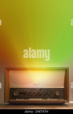 wooden old retro radio with sound beams and copy space Stock Photo