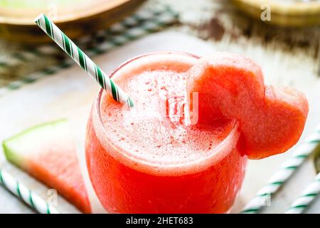natural watermelon juice decorated with fruit heart, red fruit cocktail served chilled, summer drink Stock Photo