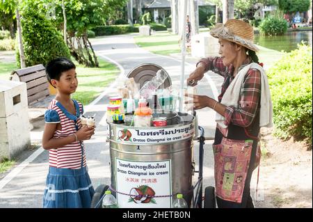 CHIANG MAI, THAILAND - 06. MAY 2018. An unidentified Asian vendor selling icecream on the street. Day editorial shot Stock Photo