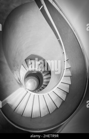 top view on spiral stair in black and white Stock Photo