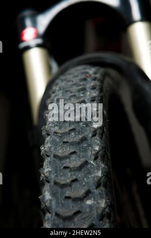 black pattern with suspension fork on black background for rough underground Stock Photo