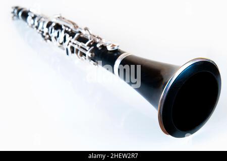 perspective of a black classic music clarinet with silver environment Stock Photo