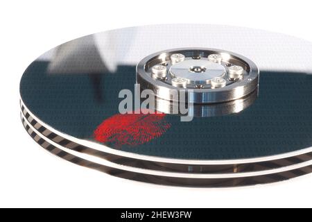 red fingerprint on a openen silver hard drive Stock Photo