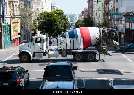 american concrete mixer truck is crossing a street in San Francisco Stock Photo