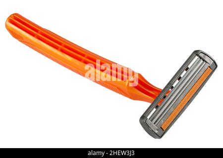 orange single-use shaver lying on the back Stock Photo