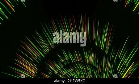 Glowing red, green, yellow lines rotating and forming a funnel. Colorful vortex spinning on black background, seamless loop. Stock Photo