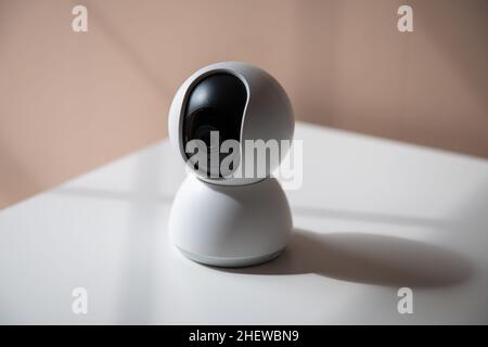 white video surveillance camera to monitor babies, children or areas of the house Stock Photo