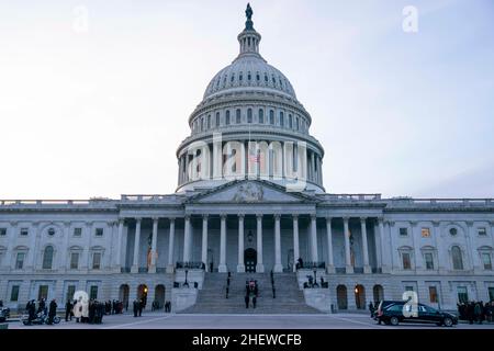 Washington, DC, USA. 12th Jan, 2022. The casket of late Senator Harry Reid departs the U.S. Capitol after lying in state in Washington, DC, U.S., on Wednesday, Jan. 12, 2022. Reid, the Democratic U.S. Senate majority leader who helped implement President Obama's legislative agenda by rounding up votes to pass Obamacare, died at 82 on Dec. 28. Credit: Sarah Silbiger/Pool via CNP/dpa/Alamy Live News Stock Photo