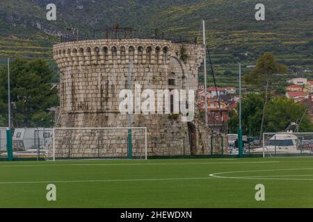 Tower and a soccer field in Trogir, Croatia Stock Photo