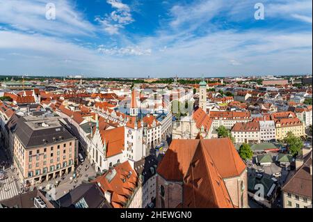 Beautiful super wide-angle sunny aerial view of Munich, Bayern, Bavaria, Germany with skyline and scenery beyond the city, seen from the observation d Stock Photo