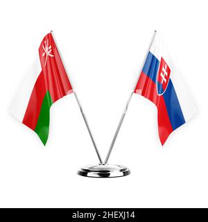 Two table flags isolated on white background 3d illustration, oman and slovakia Stock Photo