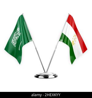Two table flags isolated on white background 3d illustration, saudi arabia and tajikistan Stock Photo