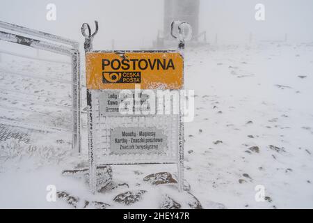 PEAK OF SNIEZKA, CZECH REPUBLIC - OCTOBER 13, 2021: Sign - high-altitude post office on peak of Sniezka mountain. Stock Photo