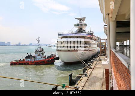 Cruise ship 'Oriental Dragon' in Penang, Malaysia (ex Royal Caribbean Cruise Line Sun Viking), became a casino ship in Hong Kong, cruises photo image Stock Photo