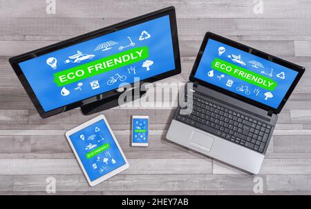 Eco friendly concept shown on different information technology devices Stock Photo