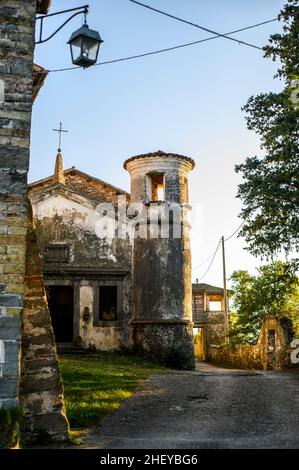 Magic of the village of Villafredda. Between autumn vineyards and historic stones Stock Photo