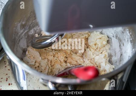 A kitchen machine is mixing dough Stock Photo