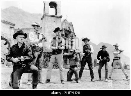The Magnificent Seven cast publicity photo. 1960. Yul Brynner, Steve McQueen, Charles Bronson, James Coburn, Robert Vaughn, Eli Wallach. Stock Photo