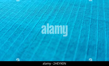 Blue cotton fabric with stripes background close-up. Stock Photo