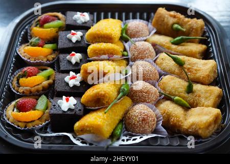 Market snacks sold in traditional food markets in Indonesia. Stock Photo