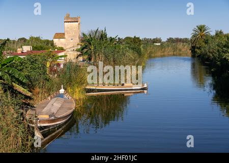 EL PALMAR, SPAIN - JUNE 24, 2021: Traditional fishing ships port of el Palmar in The Albufera natural park in Valencia. Spain. Stock Photo