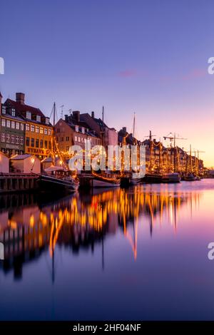 Nyhavn Canal at sunrise, Christmas time, Copenhagen, Denmark Stock Photo