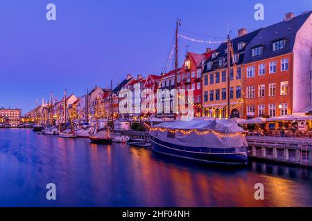 Nyhavn Canal at sunrise, Christmas time, Copenhagen, Denmark Stock Photo