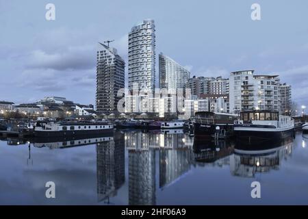 New Providence Wharf - modern residential developments dusk reflection, located in Blackwall London UK Stock Photo