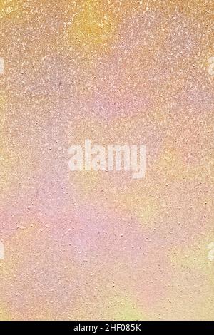 Abstract landscape of paint splatters simulating rusty metal stains, dirt, and relief of pink-yellow worn texture. Artistic texture background.Abstrac Stock Photo